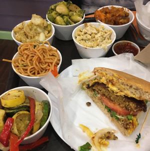 Mm cheese burger with hot and cold sides at NuVegan in College Park