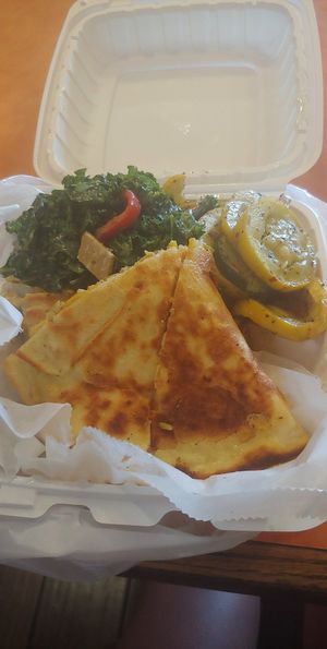 Vegan Quesadilla w/ sauteed squash and red wine kale at NuVegan in College Park