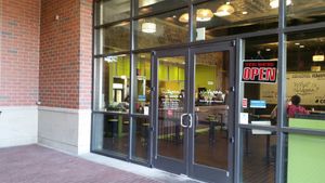 Door to NuVegan from the corridor between the parking area and the sidewalk at NuVegan in College Park