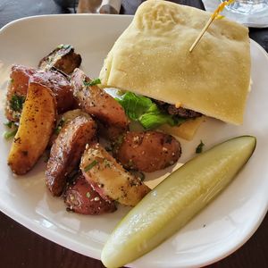 Black bean/mushroom burger with their famous potatoes at Fruits & Roots in Stuart