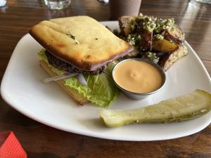 Yummy black bean burger and their to die for rosemary potatoes! A must try!  at Fruits & Roots in Stuart