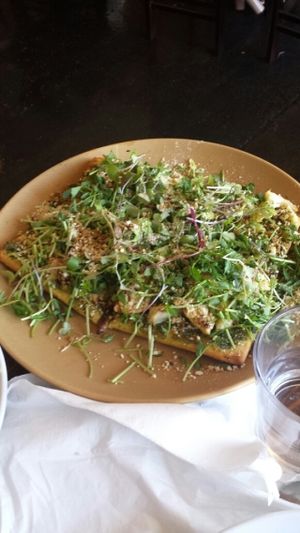 Cauliflower and garlic flatbread  at Fruits & Roots in Stuart