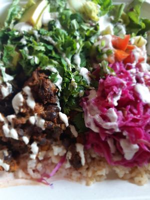 The food is so good! This burrito bowl filled me up! at Eternal Abundance in Vancouver