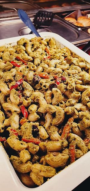 pesto pasta with capsicum, olives and avocado at Hare Krishna Food For Life in Fortitude Valley