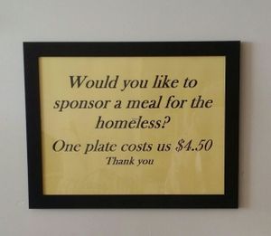 signage meal sponsor at Hare Krishna Food For Life in Fortitude Valley
