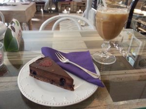 Chocolate cake and ice coffee at Sweet Secret of Raw in Prague