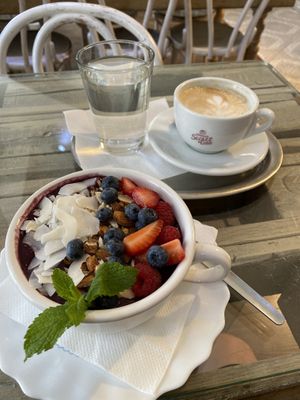 Acai bowl with Almond cappuccino. at Sweet Secret of Raw in Prague