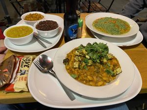 3 plates of delicious soups and stews  at Market - Dizengoff in Tel Aviv