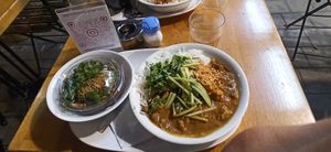 A big bowl of vegetables stew with rice (or couscous) and root salad at Market - Dizengoff in Tel Aviv