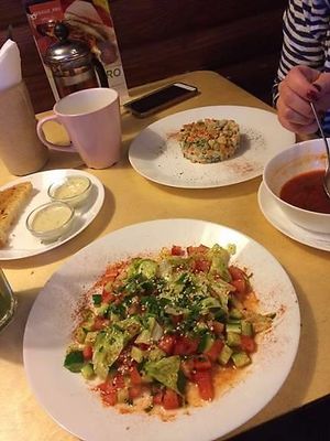 Green salad, salad olivier, garlic bread, and borscht at Veggie Bro in Vladimir
