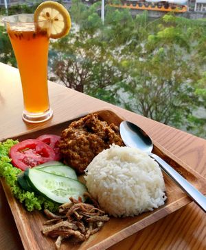 Rendang rice with passionfruit lemon beverage  at nomVnom Bistro - Clarke Quay in Central Singapore