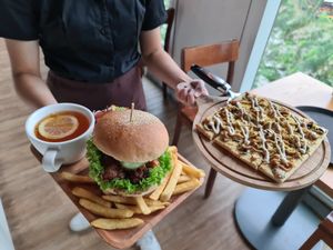 Burger set and Monkey King Truffle Pizza at nomVnom Bistro - Clarke Quay in Central Singapore