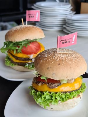Single and Doube Toona OmniMeat Cheezy Burger. at nomVnom Bistro - Clarke Quay in Central Singapore
