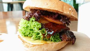 Tempelicious chilli tempeh burger with cheese at nomVnom Bistro - Clarke Quay in Central Singapore