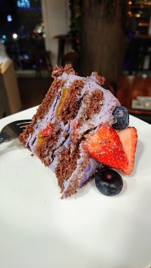 blueberry cream cake with chocolate sponge at nomVnom Bistro - Clarke Quay in Central Singapore