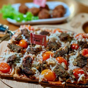 Cheezy Omnimeat Pizza at nomVnom Bistro - Clarke Quay in Central Singapore