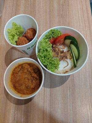 Rendang rice with banana fritters at nomVnom Bistro - Clarke Quay in Central Singapore