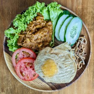 Toon Rendang Rice with Vegan Fried PlantEgg at nomVnom Bistro - Clarke Quay in Central Singapore