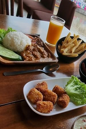 Toon rendang rice (made of mushrooms) and Banana fritters at nomVnom Bistro - Clarke Quay in Central Singapore