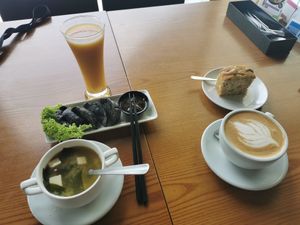 Mushrooms soup, charcoal gyoza, banana cake at nomVnom Bistro - Clarke Quay in Central Singapore