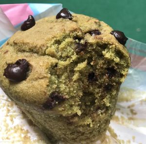 Vegan matcha chocolate chip muffin with a bite taken because thanks to Steve Jobs it just looks cooler than without! at nomVnom Bistro - Clarke Quay in Central Singapore