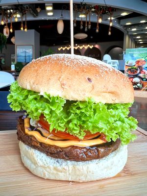 Black Peppered Cowless Burger  at nomVnom Bistro - Clarke Quay in Central Singapore