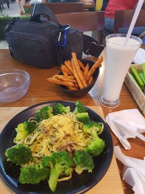 Spinach Linguine... A bit salty and peppery. Add broccoli for $1.50. Sweet potatoes fries are hot and crispy. Unsweetened soy milk.... Just about to hit $20 at nomVnom Bistro - Clarke Quay in Central Singapore