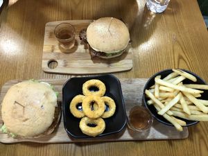 Nom nom burger, golden rings, fries and temptations burger  at nomVnom Bistro - Clarke Quay in Central Singapore