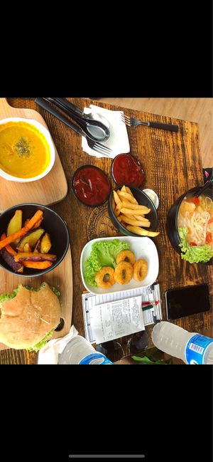 Bit of everything. NomNom burger, pumpkin soup, chips at nomVnom Bistro - Clarke Quay in Central Singapore