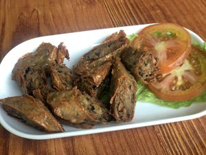 This is nicely seasoned but too oily at nomVnom Bistro - Clarke Quay in Central Singapore