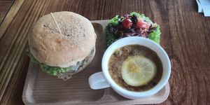 Lion mane burger set 4. Comes with salad and great tasting lemon passionfruit tea.. at nomVnom Bistro - Clarke Quay in Central Singapore