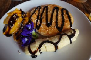 Pancake with banana and mango. at La Carotte Qui Rit in Koh Tao