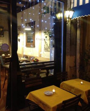 Cosy, little crêperie. They have antique wooden Breton furniture and photos of their family in traditional dress on the walls. at Mad'eo in Paris