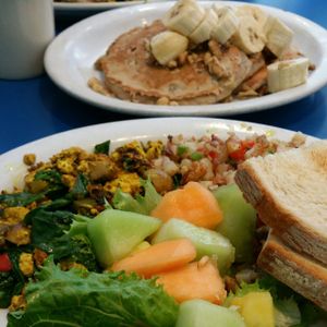 vegan potato hash, tofu scramble, fruit, and toast + vegan banana walnut pancakes at Monty's Blue Plate Diner in Madison