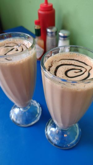 They split the (vegan) milkshake for us to share at Monty's Blue Plate Diner in Madison