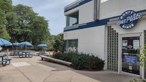 Outdoor patio and small parking lot at Monty's Blue Plate Diner in Madison