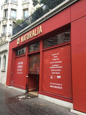Entrance mentioning vegan products at Naturalia - Pyrenees in Paris