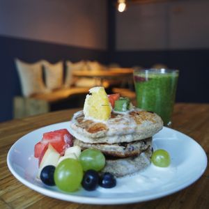 Saturday breakfast option: buckwheat-banana pancakes with blueberries  at Barkett in Berlin