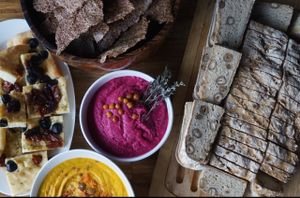 homemade gluten free bread, raw crackers and spreads on Sunday brunch  at Barkett in Berlin