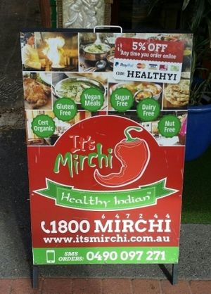 a-frame street sign at Its Mirchi Healthy Indian in Paddington