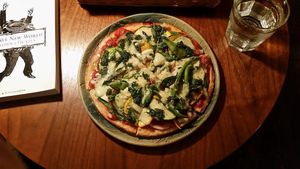 Vegan Pizza topped with tomato sauce, veggies & a vegan cheese made from millet. Very tasty, very realistic taste of cheese, but slightly hard to eat(too much veggies on top) 7/10 at Hiruneko Shokudou in Itoshima