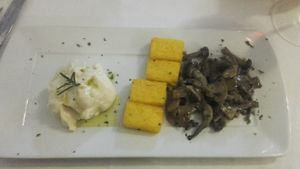 Tris of cheeses with fried polenta and mushrooms. This thing is incredible. at Pinzimonio in Venice