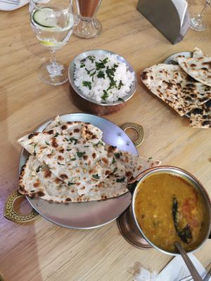 Yellow lentil curry and garlic naan at India Town in Mexico City