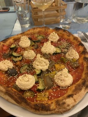 Pizza with vegan philadelphia made out of chickpeas  at Pizzeria Capri in Jesolo