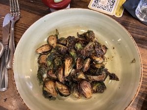 Roasted Brussels sprouts with vinaigrette  at Busboys and Poets - Monroe St in Washington