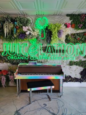 Little kid was playing piano when we came in at Juicelation in Naples
