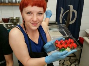 owner Marcy with spicy sushi at The Root in Wroclaw
