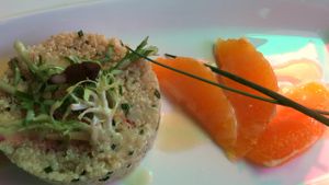 Entrée vegane à base de quinoa avec une délicieuse sauce et des orange et herbes.  at La Table de Cana in Nimes