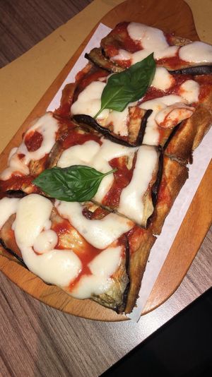 Aubergine pizza with vegan cheese at Pizza Pala Romana in Bangkok