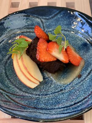 Vegan chocolate cake with fresh fruit and mint at Sekai Cafe - Asakusa in Tokyo